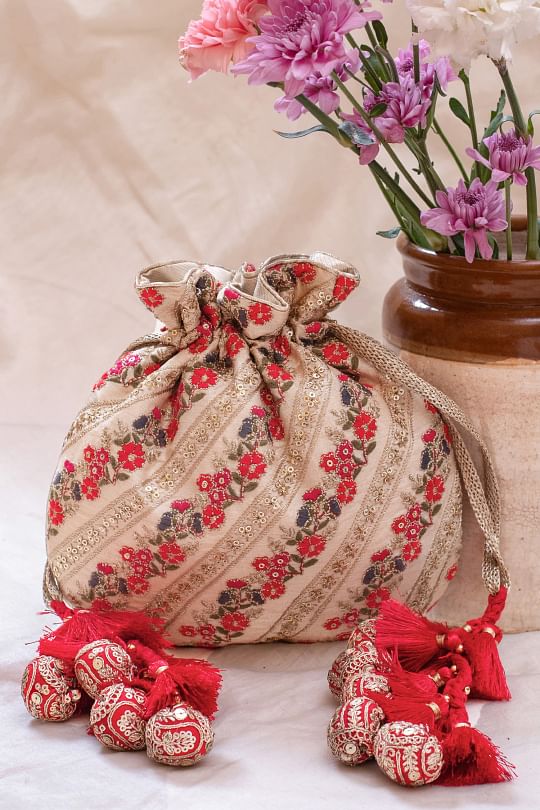 Buy Teal printed potli bag by Rabani Rakha at Aashni and Co