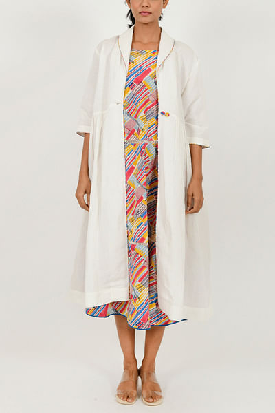 Off-white long jacket and printed dress