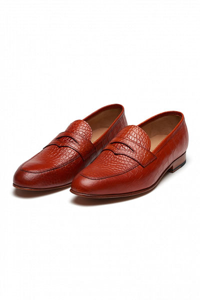 Orange textured leather penny loafers