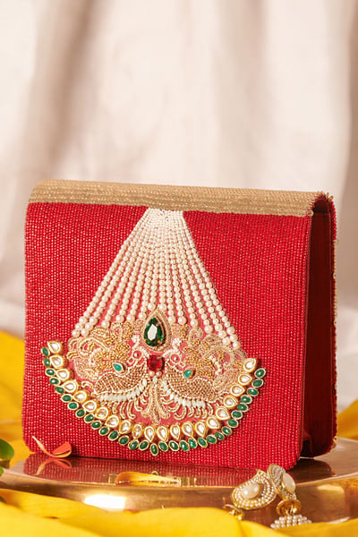 Passa and peacock embellished clutch