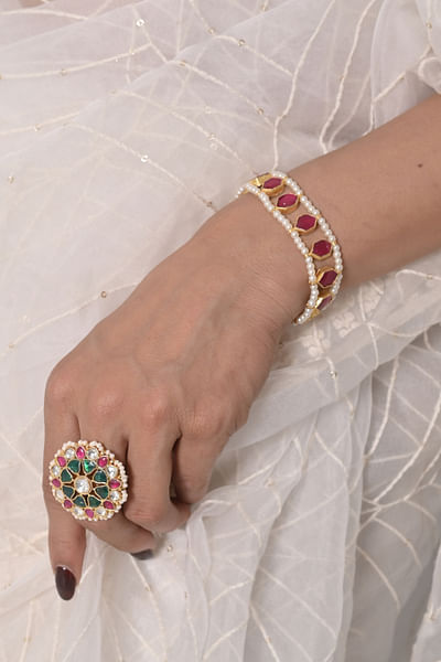 Pink kundan and pearl bracelet
