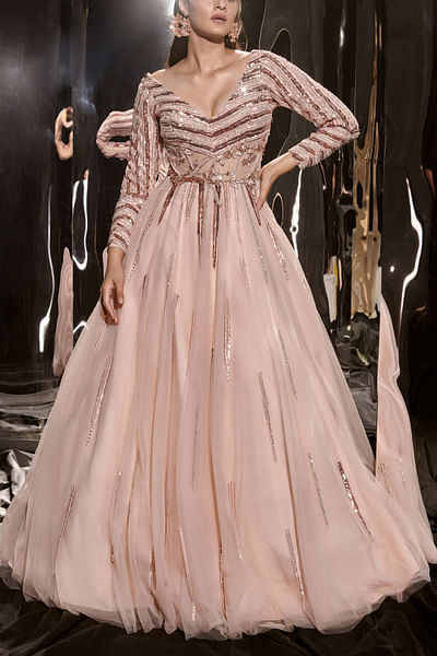 Pinkish nude sequin embellished full-sleeved gown