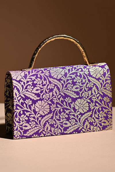 Purple brocade clutch