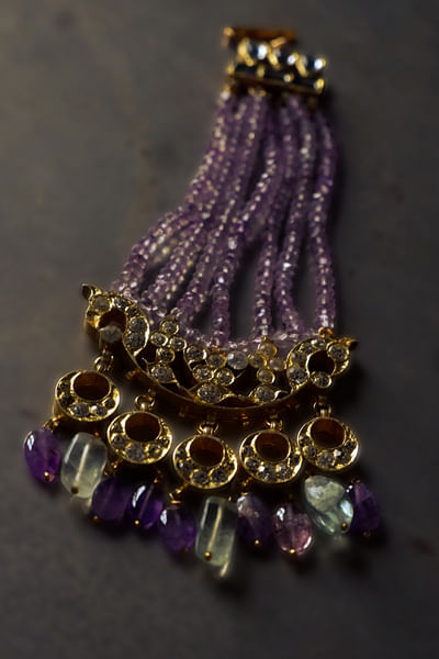 Purple semi-precious gemstone passa