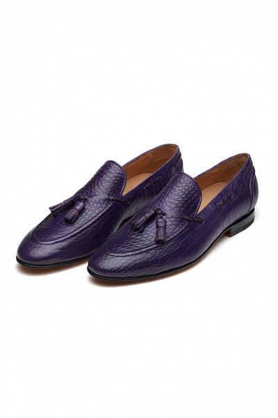 Purple tasselled textured leather loafers