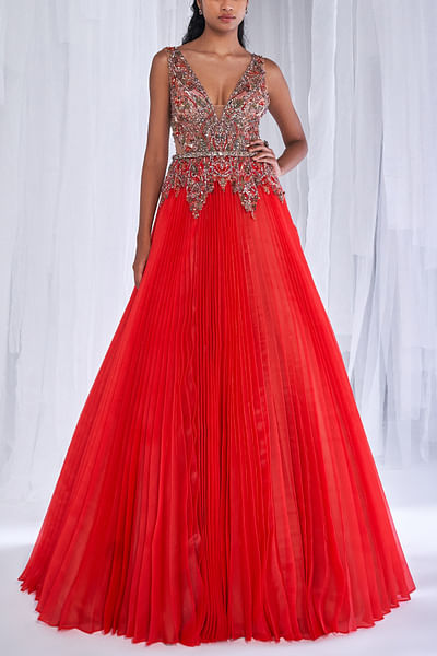 Red embroidered pleated gown