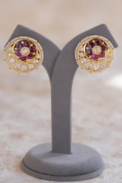 Red stone embellished studs