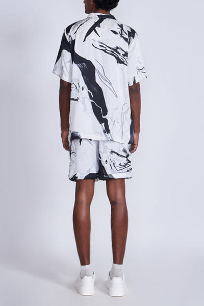 Advait White abstract printed shorts AVTJAN24D113