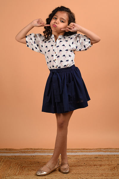 White flamingo print top and skirt