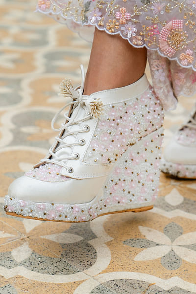 White hand embroidered sneaker wedges