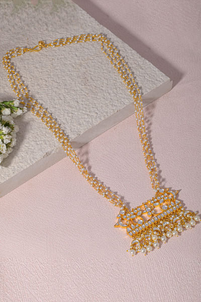 White kundan and pearl embellished long necklace