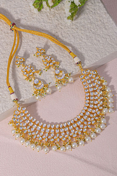 White kundan and pearl embellished necklace set