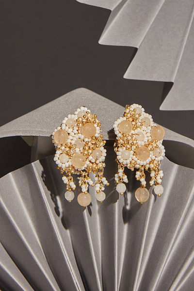 White mother of pearl studded studs