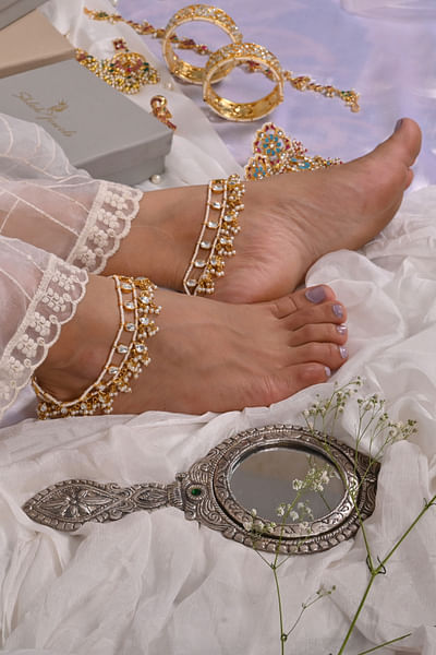 White pearl and kundan anklets