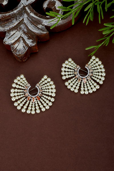 White pearl embellished earrings