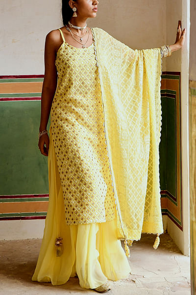 Yellow chikankari and sequin embroidered strappy kurta and gharara set