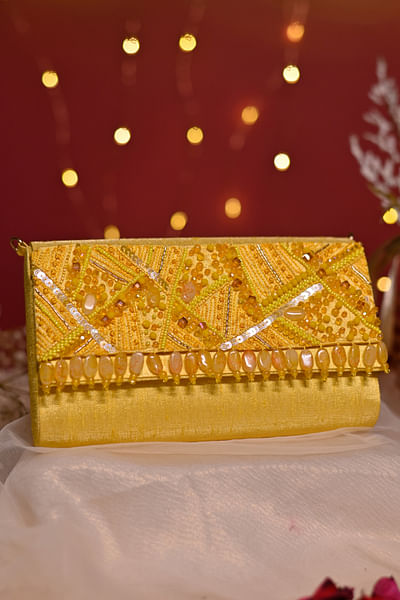 Yellow embellished clutch