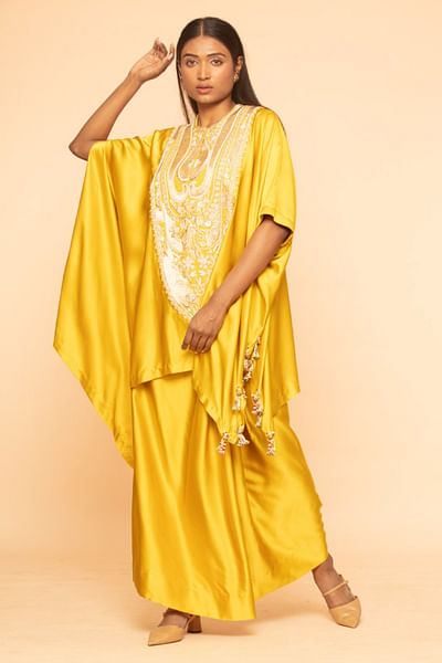 Yellow embroidered top and lungi skirt