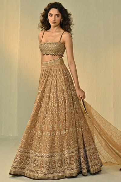 Golden and beige embroidered lehenga set