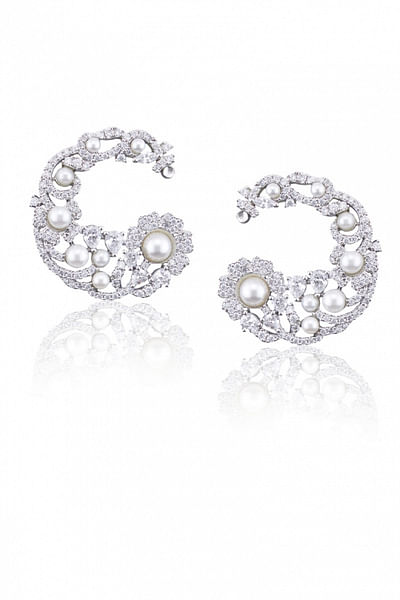 Diamond and pearl studded earrings