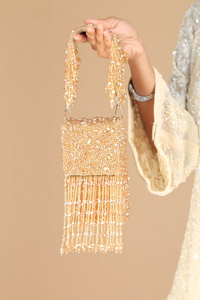 Gold crystal tasselled mini clutch bag