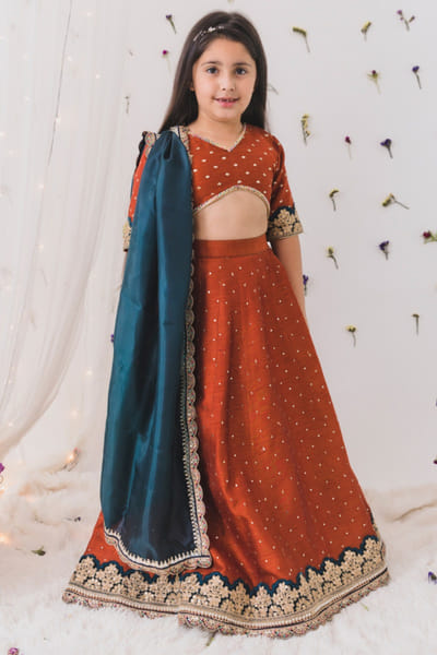 Rust silk lehenga set