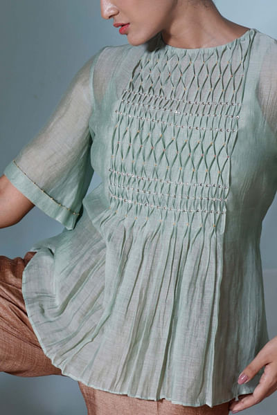 Green embellished top
