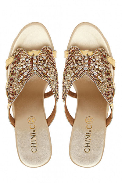 Gold embellished wedges