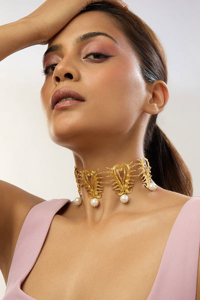 Gold heart and pearl statement choker