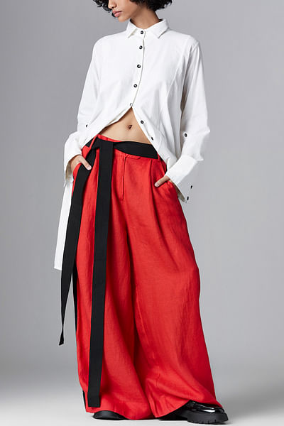 Light red pleated trousers