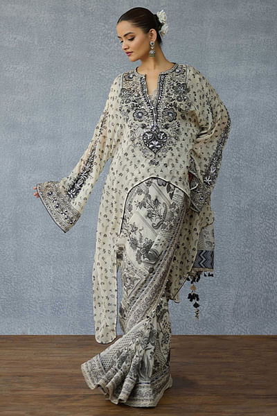 Black and white cape-style top