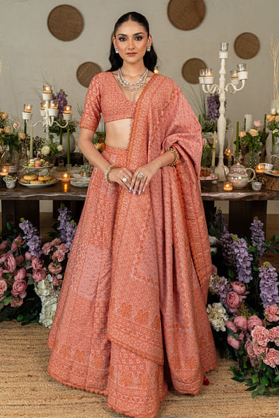 Orange floral and paisley woven lehenga set