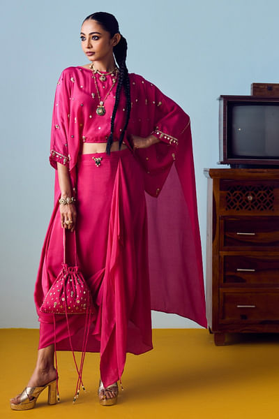 Pink embroidered high low top and skirt