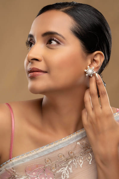 Silver pearl-studded earrings