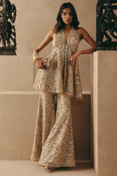 Golden mirror embroidered peplum top