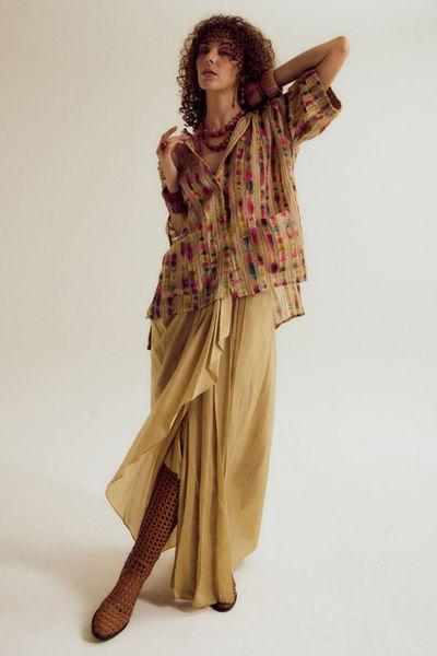 Ecru asymmetrical pleated skirt