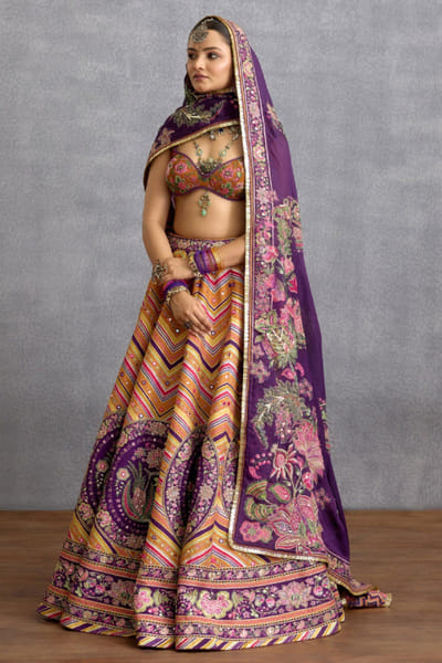 Orange and purple printed silk lehenga set