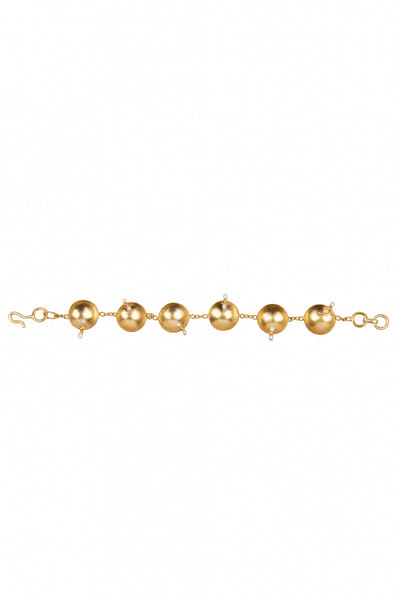 Gold and pearl charm bracelet