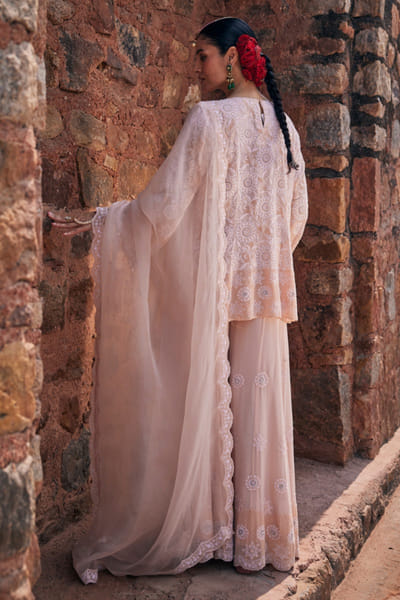 Dhaaga and Co. Peach chikankari floral pattern sharara set DHAAJUN26D147507