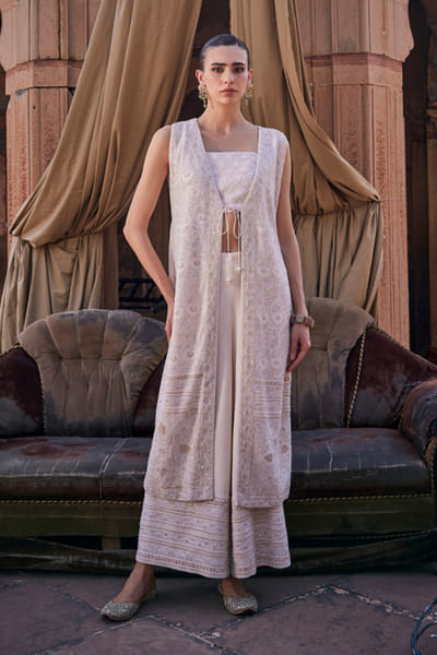 Dhaaga and Co. Ivory chikankari long jacket and trouser set DHAAJUN26D147516