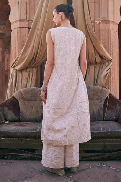 Dhaaga and Co. Ivory chikankari long jacket and trouser set DHAAJUN26D147516