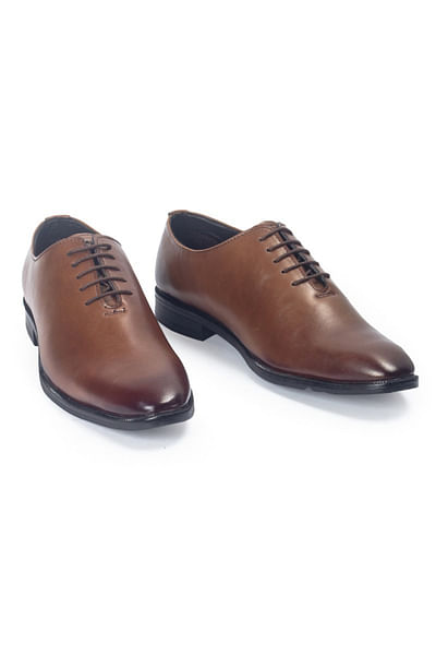 Tan lace-up derby shoes