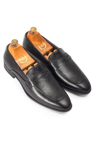Black handcrafted faux leather penny slip-ons