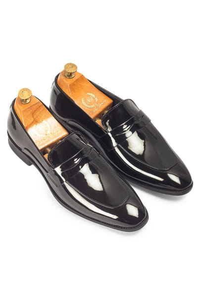 Black faux leather penny slip-on shoes