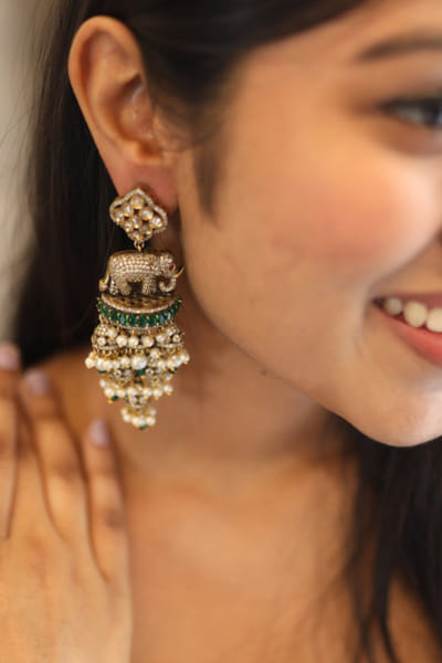 Gold and green polki danglers