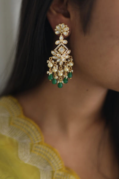 Gold and green kundan danglers