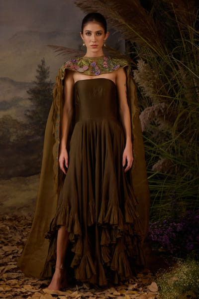 Olive ruffled gown and embroidered cape