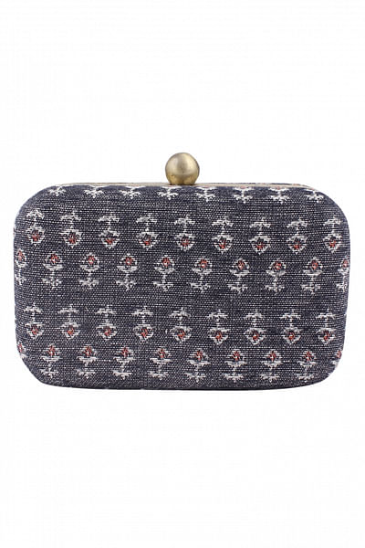 Floral woven clutch