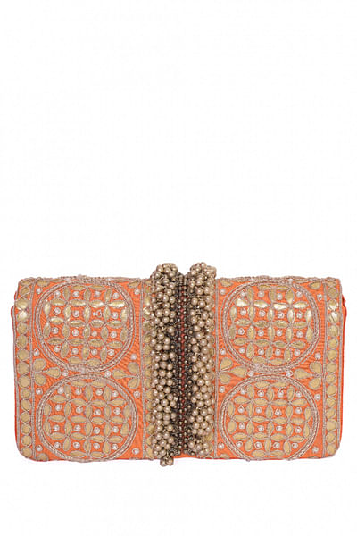 Orange ghungroo embellished clutch