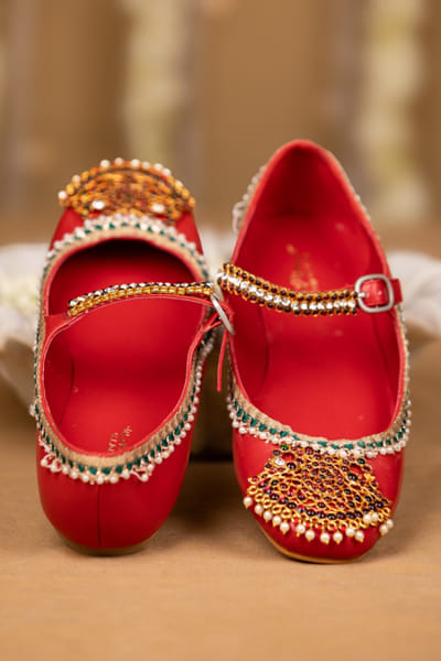 Red kundan studded Mary Jane shoes